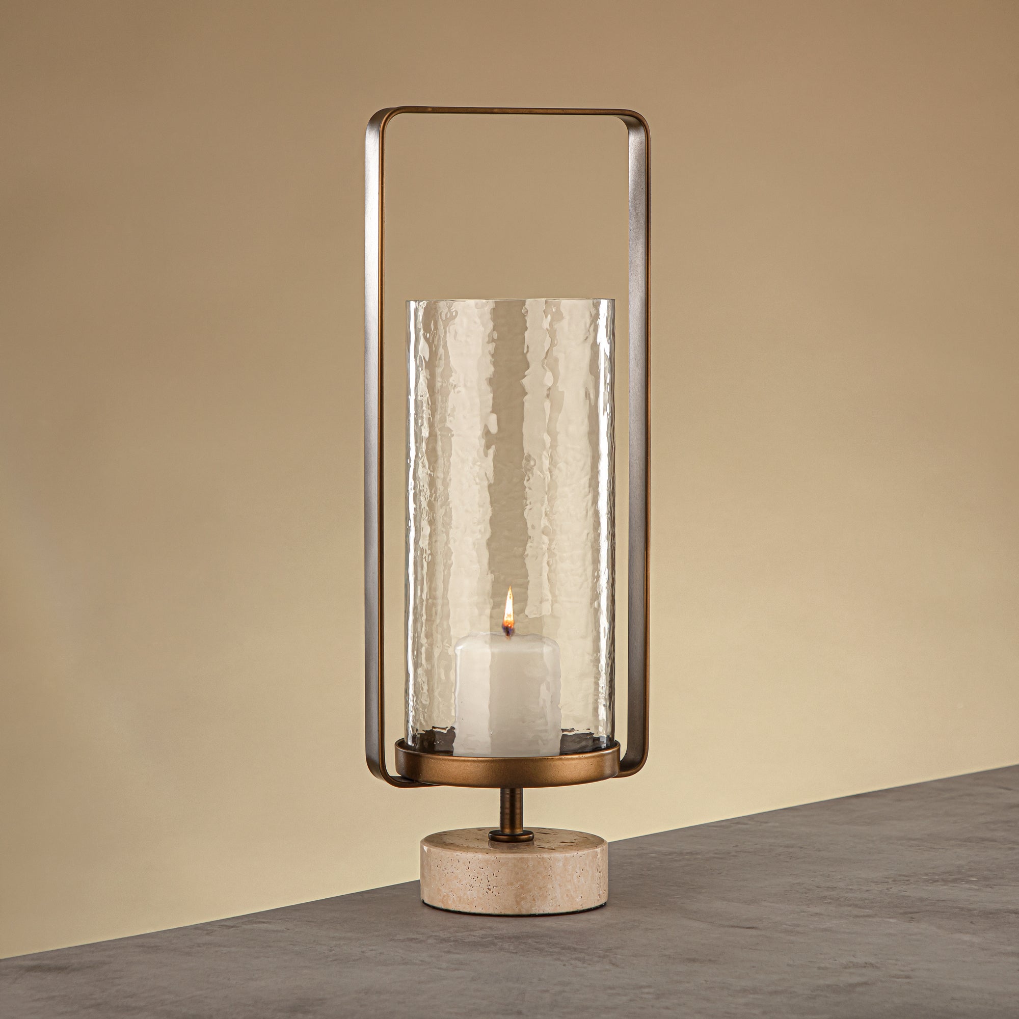 Almarjan Kalon Hurricane Lantern Hammered Clear Glass 16x10.5x43.5 CM Brushed Gold & Travertine Base (GMT2960029)